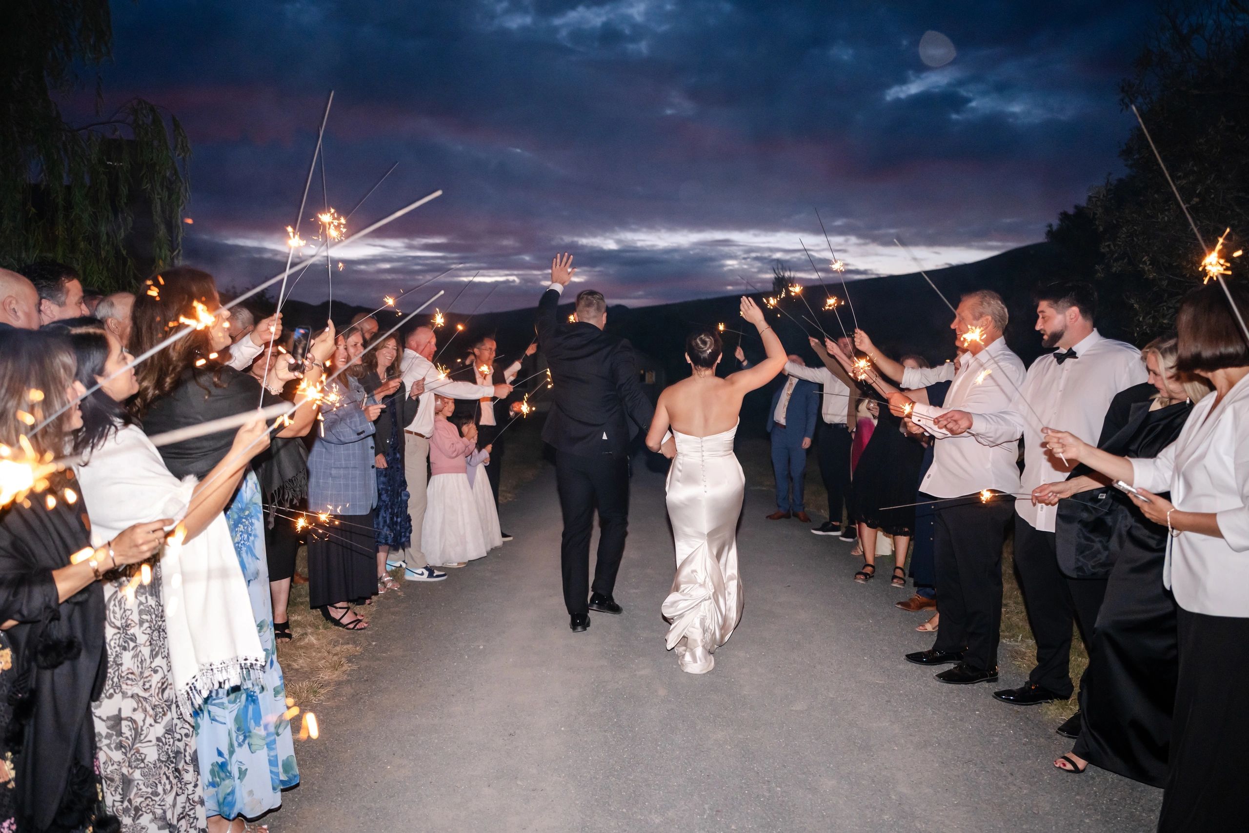 Sparkler aisle wedding at dusk