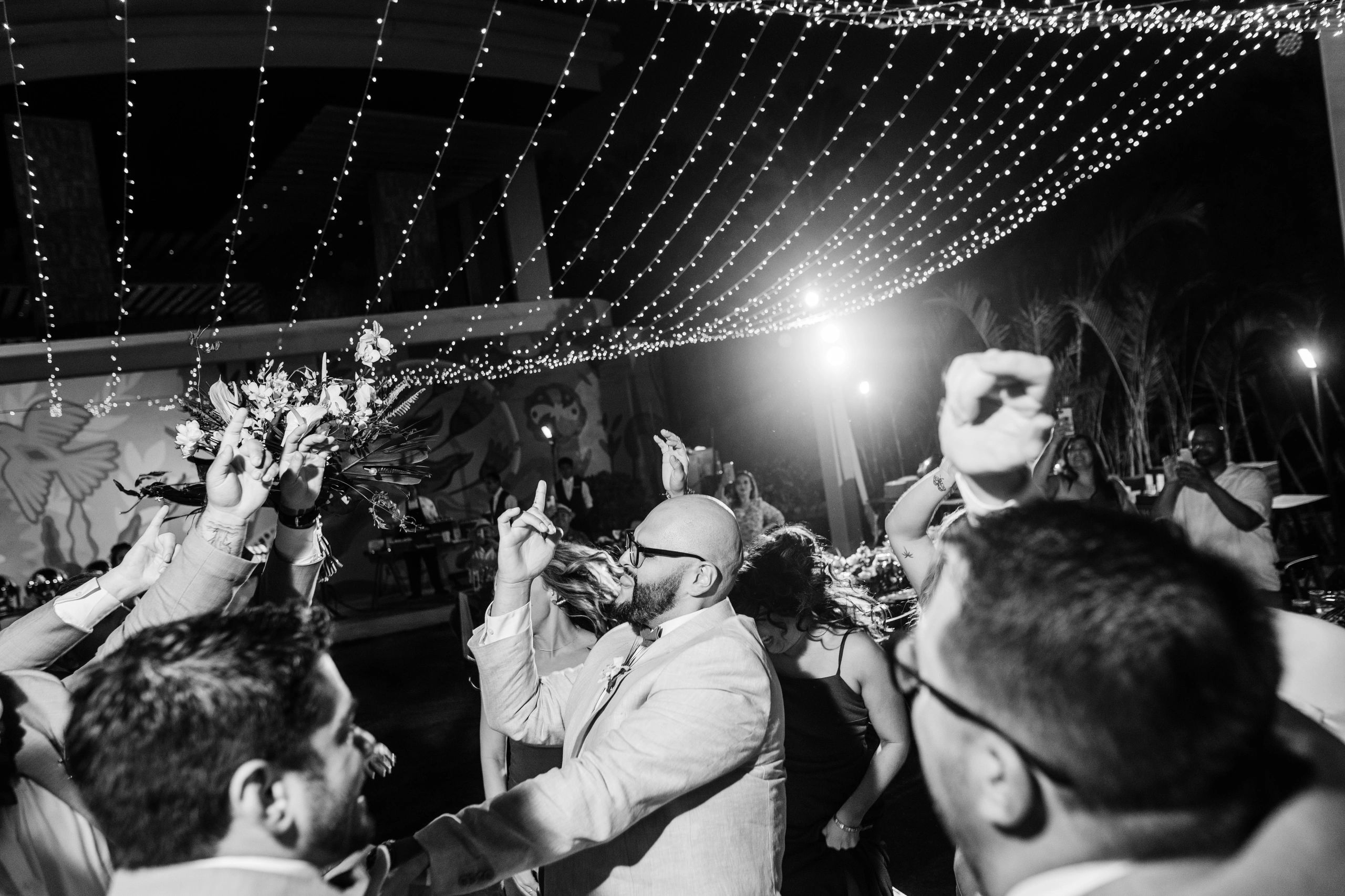 Wedding tent bouquet toss