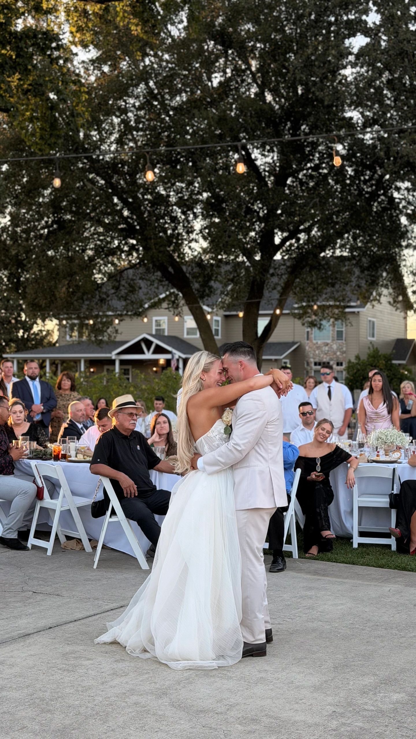 Bride and groom first dance outdoors