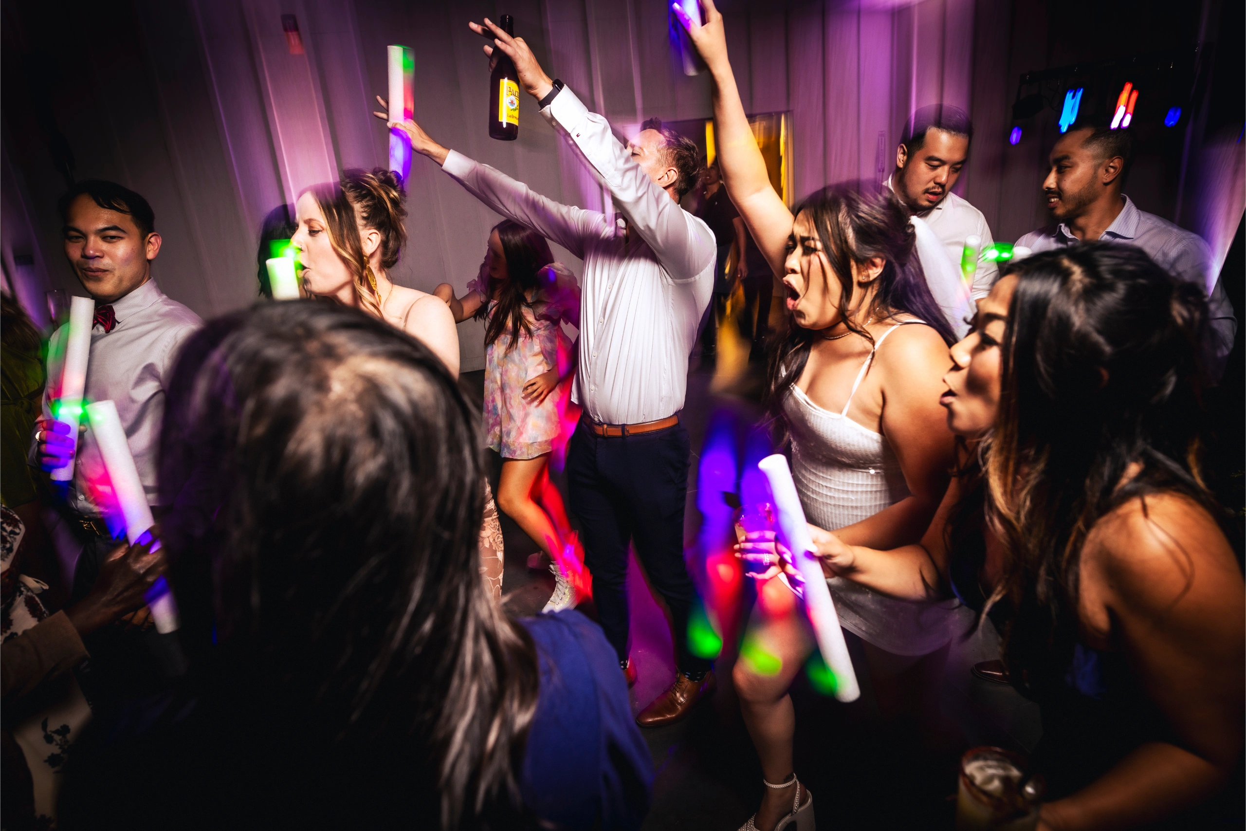 Nightclub neon light sticks dancing